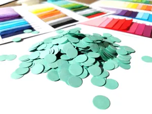 Mint green round paper confetti for party decorations and gift box filling, 1kg pack.