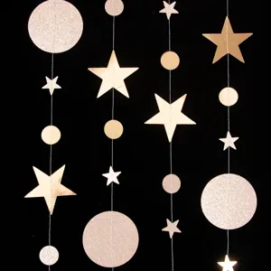 Close-up detail of hanging star and circle garland, ideal for party and holiday decor.