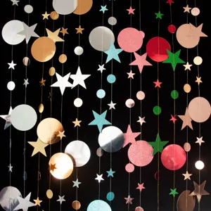 Hanging star and circle paper garland decoration details for party and wedding backdrop.