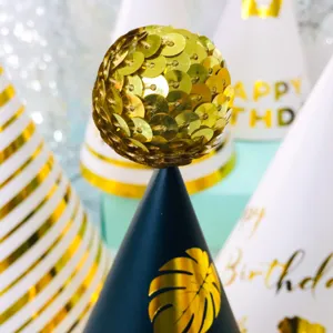 Gold sequin ball birthday party hat detail shot, festive celebration party hat decoration.
