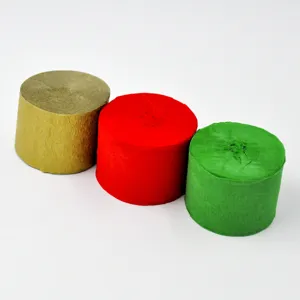 Christmas crepe paper rolls decorative colored streamers for holiday party background setup.