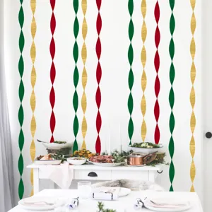Christmas crepe paper rolls decorative colorful wavy streamers for holiday party background wall.