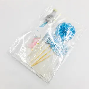 Blue paper fan cake topper set for birthday party cake decoration and baking supplies.