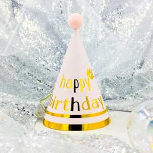 Pink conical birthday hat with pom pom and happy birthday text for kids party celebration.