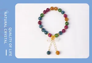Multicolor tourmaline bead bracelet with lily of the valley pendant and delicate chain details.