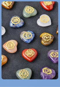Natural crystal heart chakra stones detail shot, healing gemstone set for yoga meditation.