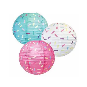Colorful round paper lanterns set for birthday party decorations, donut theme hanging decor.