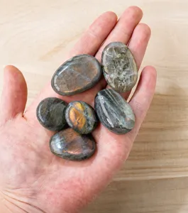 Natural labradorite crystal palm stones, raw gemstone mineral specimen for healing decor.