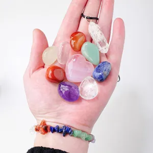 Natural crystal tumbled stones chakra set with rose quartz heart pendant and chip bracelet.