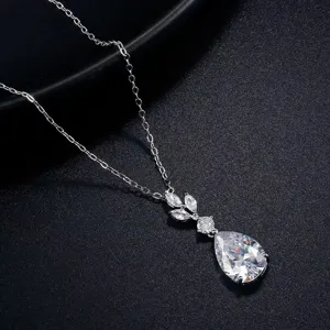 Elegant silver-tone pendant necklace featuring sparkling pear and marquise cubic zirconia stones.