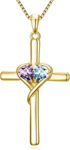 Gold cross necklace with dual heart gemstones detail, elegant faith jewelry pendant.