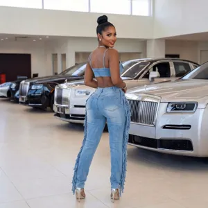 Conjunto de top corto y pantalones de mezclilla con flecos para mujer, jeans ajustados elásticos.
