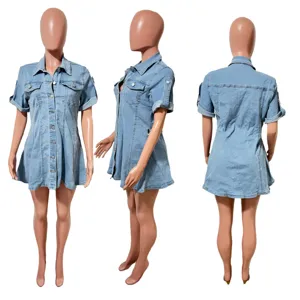 Short sleeve denim dress detail featuring classic lapel, metal buttons and waist cinched design.