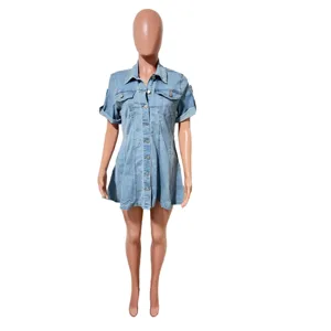 Detailed view of the light blue denim shirt dress, featuring a classic lapel and single-breasted buttons.