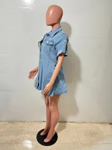 Side view detail of casual light blue short sleeve denim dress with lapel and buttons.