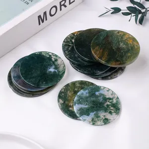 Natural moss agate gemstone round slice cabochon for jewelry making and crystal collection.