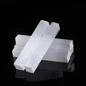 Natural Moroccan selenite crystal wand detail shot, raw gypsum mineral home decor stone.