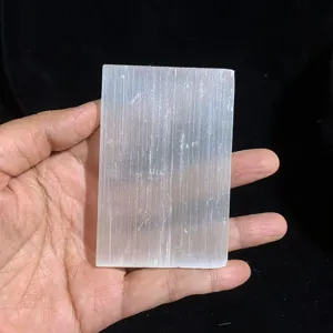 Natural Moroccan selenite crystal plate raw stone healing mineral home decor detail view.