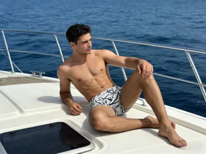 Men's bamboo print swim trunks, detailed view of the stylish elastic beach wear style.