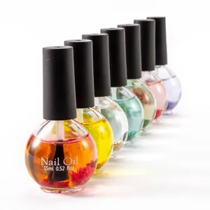 Dried flower nail oil 15ml bottle detail showing colorful liquid, nail care moisturizing.