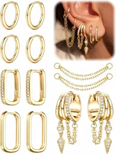 Primo piano dettagliato di orecchini a cerchio dorati multipli e catene per look alla moda.