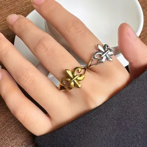 Vintage double finger ring with retro design, silver and bronze finish for daily wear.