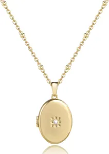 Close-up of gold-plated brass oval locket pendant necklace with sparkling cubic zirconia.