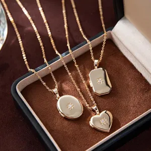 Gold-plated locket necklaces set featuring oval, heart and geometric pendants with cubic zirconia.