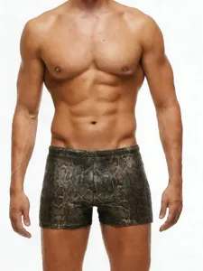 Men's low-waist metallic snake print swim trunks stylish beach shorts for summer vacation.