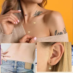 Gold plated brass heart cartilage piercing studs and star drop earrings detailed shot.