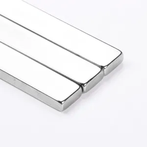 Detailed shot of strong rectangular neodymium block magnets for cat eye gel nail art design.