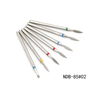 Detailed shot of 7pcs diamond nail drill bits set with colorful rings for electric manicure file.