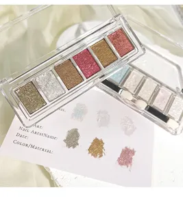Detailansicht der 6-farbigen soliden Glitzer-Lidschatten- und Nagelkunst-Palette im klaren Etui.