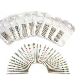 Professional diamond nail drill bits set, metal manicure accessories for salon use.