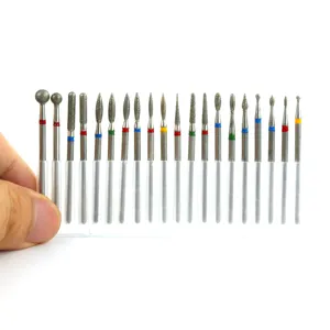 Professional diamond nail drill bits set for manicure and removal, assorted metal shapes.