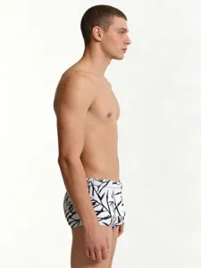 Men's bamboo print elastic swim trunks with comfortable drawstring waist for beach.