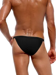 Men's sexy black solid color triangle swim briefs fashion beach swimwear for summer.