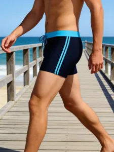 Men's blue boxer briefs swim trunks with drawstring and side stripes for swimming.