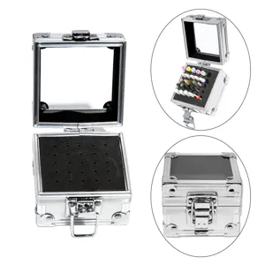 Aluminum nail drill bit storage box with foam interior and clear lid for organization.