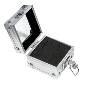 Detailed view of the aluminum nail drill bit storage box showing the foam insert and metal.