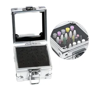 Metal nail drill bit storage box with foam holder and display window for salon tools.