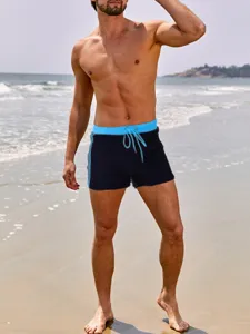 Details of men's solid color swim trunks, comfortable breathable nylon boxer swimwear.