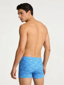 Men's blue printed boxer swim briefs, fashionable beach swimwear for summer surfing vacations.
