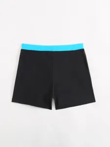 Men's swim trunks flat lay black with contrast blue waistband comfortable swimwear for summer beach