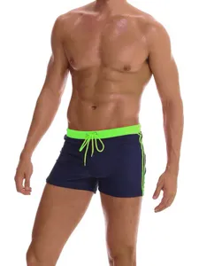 Men's solid color swim trunks with neon green waistband drawstring beach board shorts