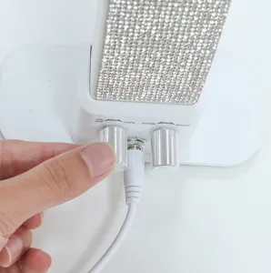 Rhinestone nail lamp control panel detail, adjustable brightness and color temperature settings.
