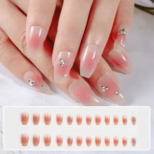 Uñas postizas blush con pedrería, elegante set de manicura acrílica para mujeres.