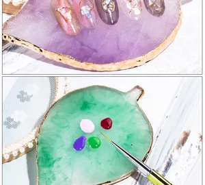 Resin nail art palette leaf shaped display board with gold edge for professional salon use.