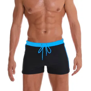Men's swim trunks solid color flat-corner beach board shorts with drawstring waist.