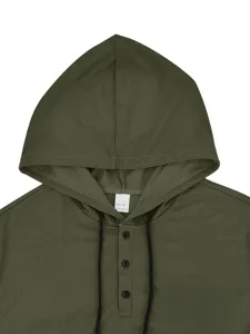 Close up view of the army green short sleeve hoodie collar with drawstring and black buttons.